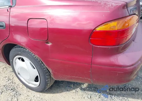 2000 Chevrolet Prizm from USA, damaged, VIN 1Y1SK5282YZ428822